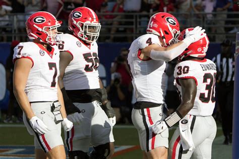 Beck, Edwards account for 2 TDs each and No. 1 Georgia thumps Florida 43-20 in ‘Cocktail Party’